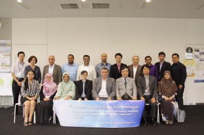 front row center: hosts., others: participants