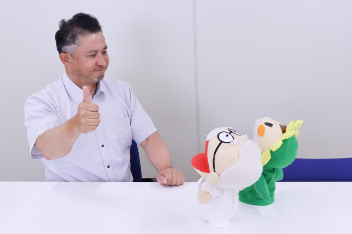 了解、答えるよとポーズをとる松永さん